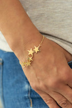 Load image into Gallery viewer, All-Star Shimmer- Gold Star Bracelet- Paparazzi Accessories
