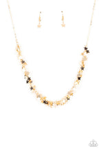 Load image into Gallery viewer, Starry Anthem- Gold Star Necklace- Paparazzi Accessories
